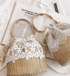 Floral Accents Straw Drawstring Bag