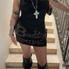 Studded Mini Skirt and Draped Halter Top
