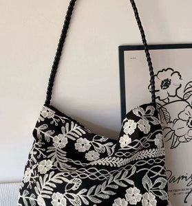 Elegant Lace Handbag with Braided Handle