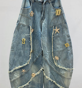 Barrel Jeans with Distressed Details