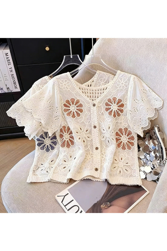 Floral Buttoned Blouse with Intricate Patterns