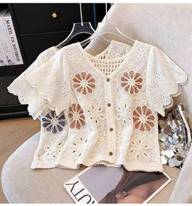 Floral Buttoned Blouse with Intricate Patterns