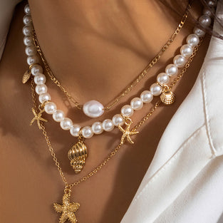 Layered Pearl and Gold Charm Necklace