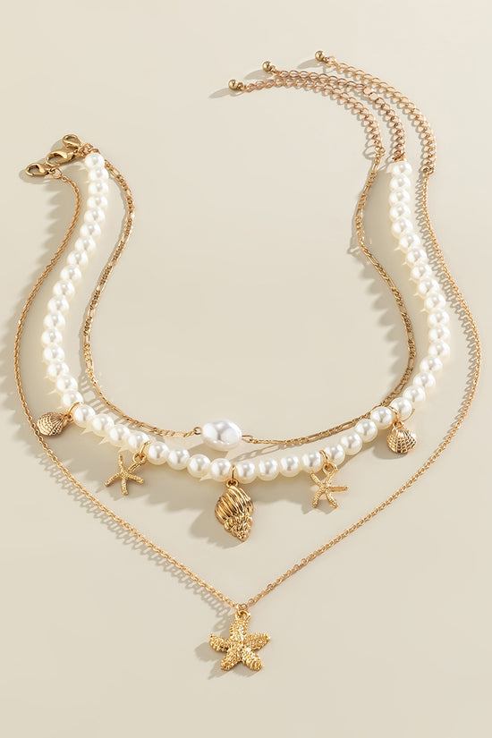 Layered Pearl and Gold Charm Necklace