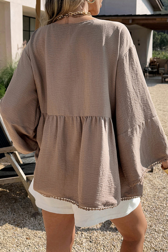 Flowing Peplum Tie-Front Top