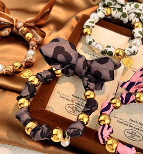 Elegant Bow and Bead Bracelet