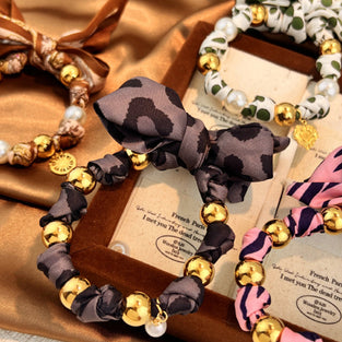 Elegant Bow and Bead Bracelet