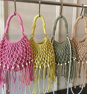 Elegant Woven Handbag with Tassel Trim