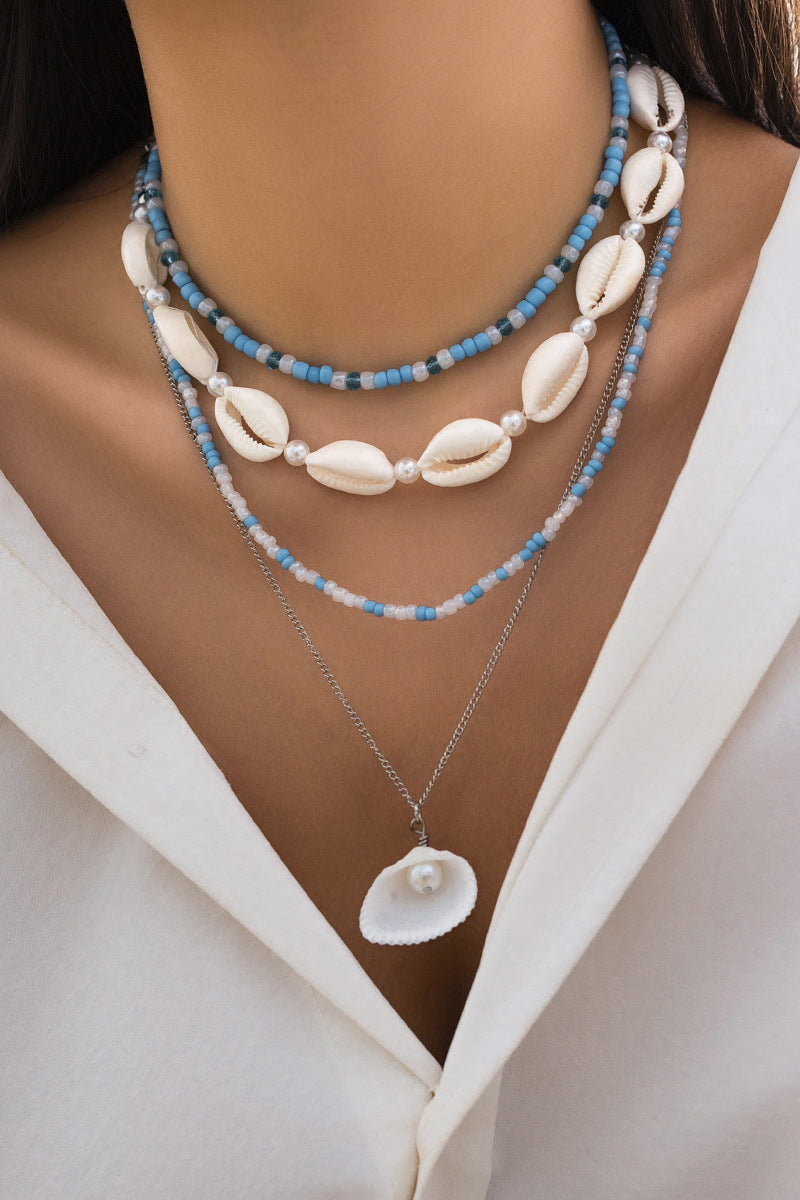 Elegant Layered Pearl Charm Necklace